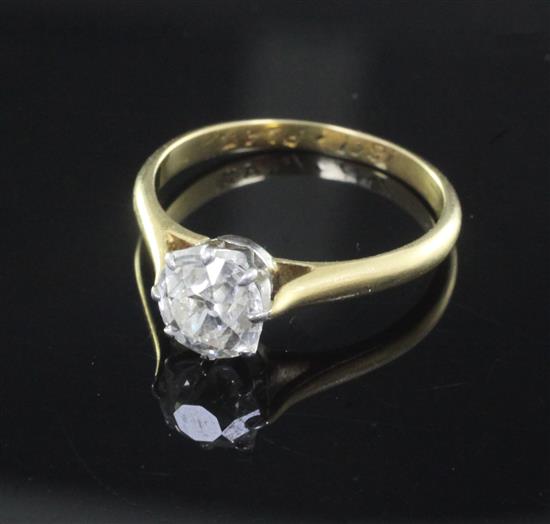 An 18ct gold, platinum and solitaire diamond ring, size L.
